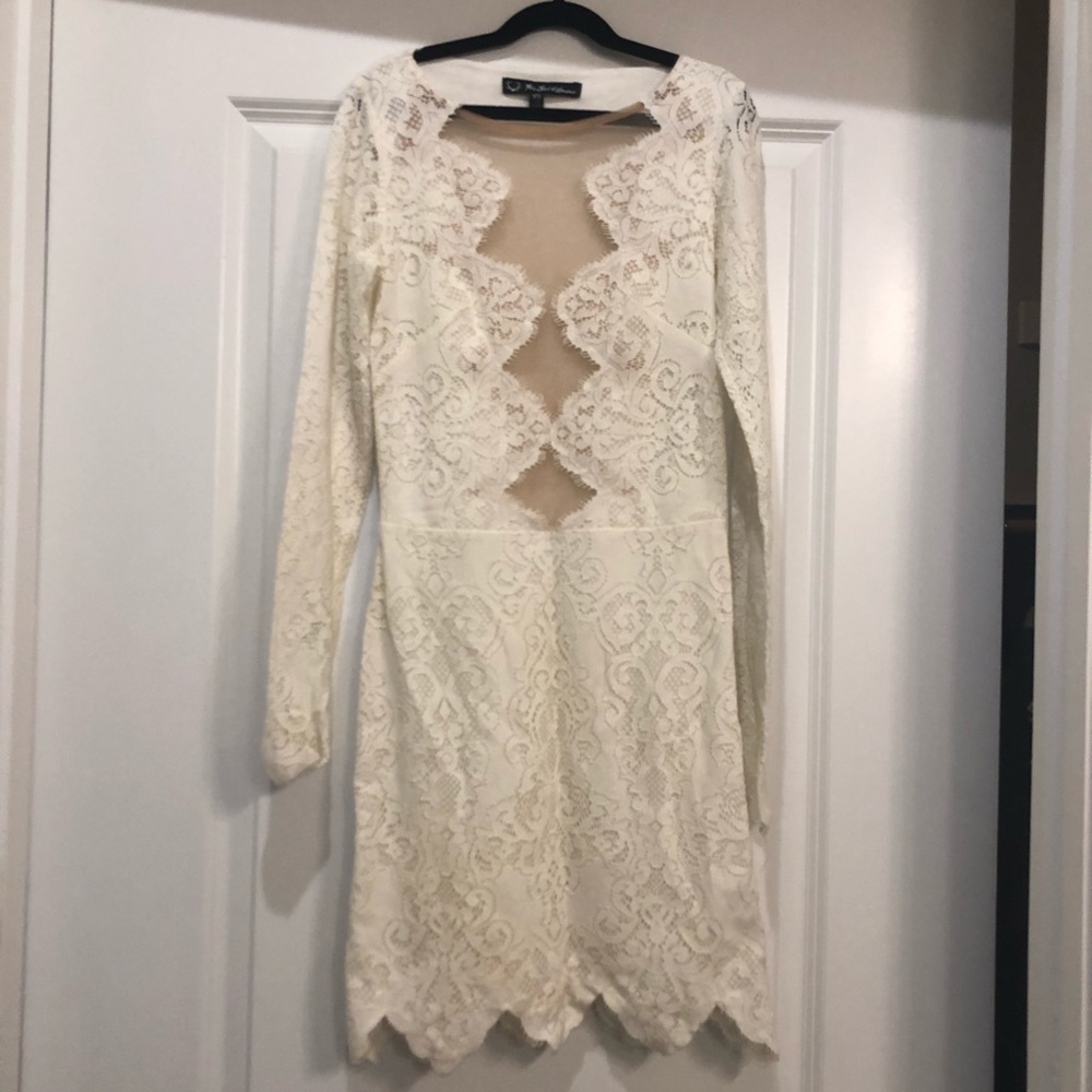 White long sleeved lace For Love and Lemons dress